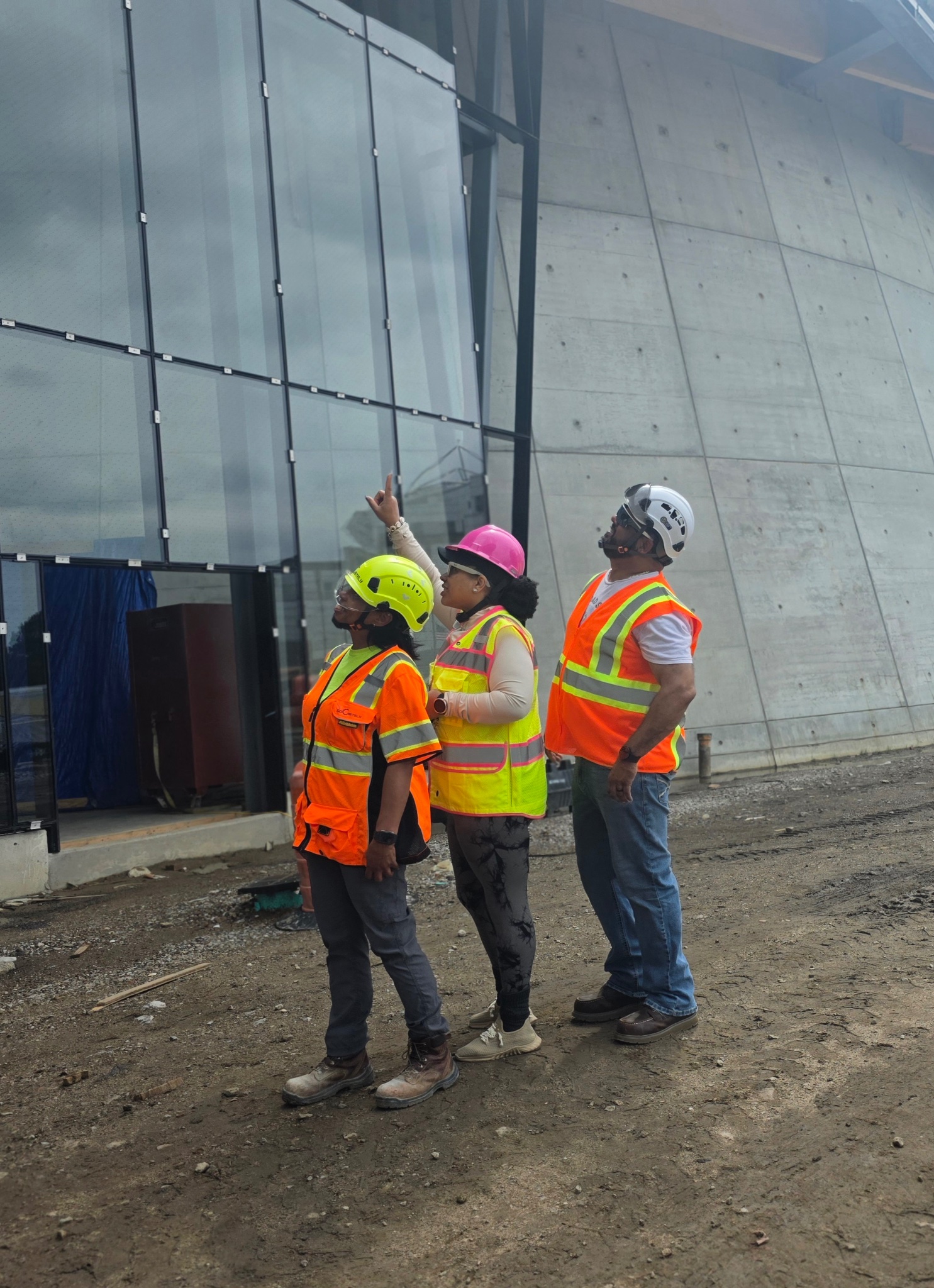 SoCretely team on the job site reviewing construction