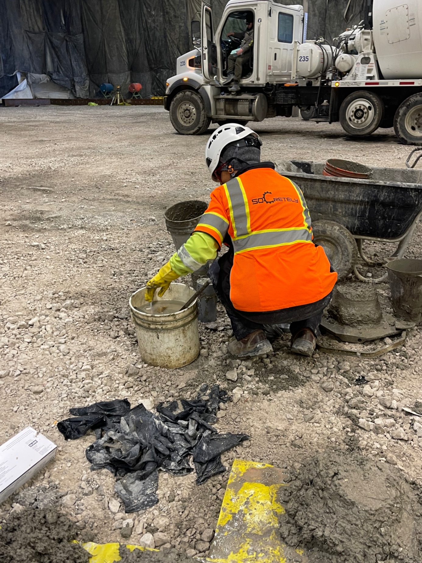 Field technician collecting concrete sample