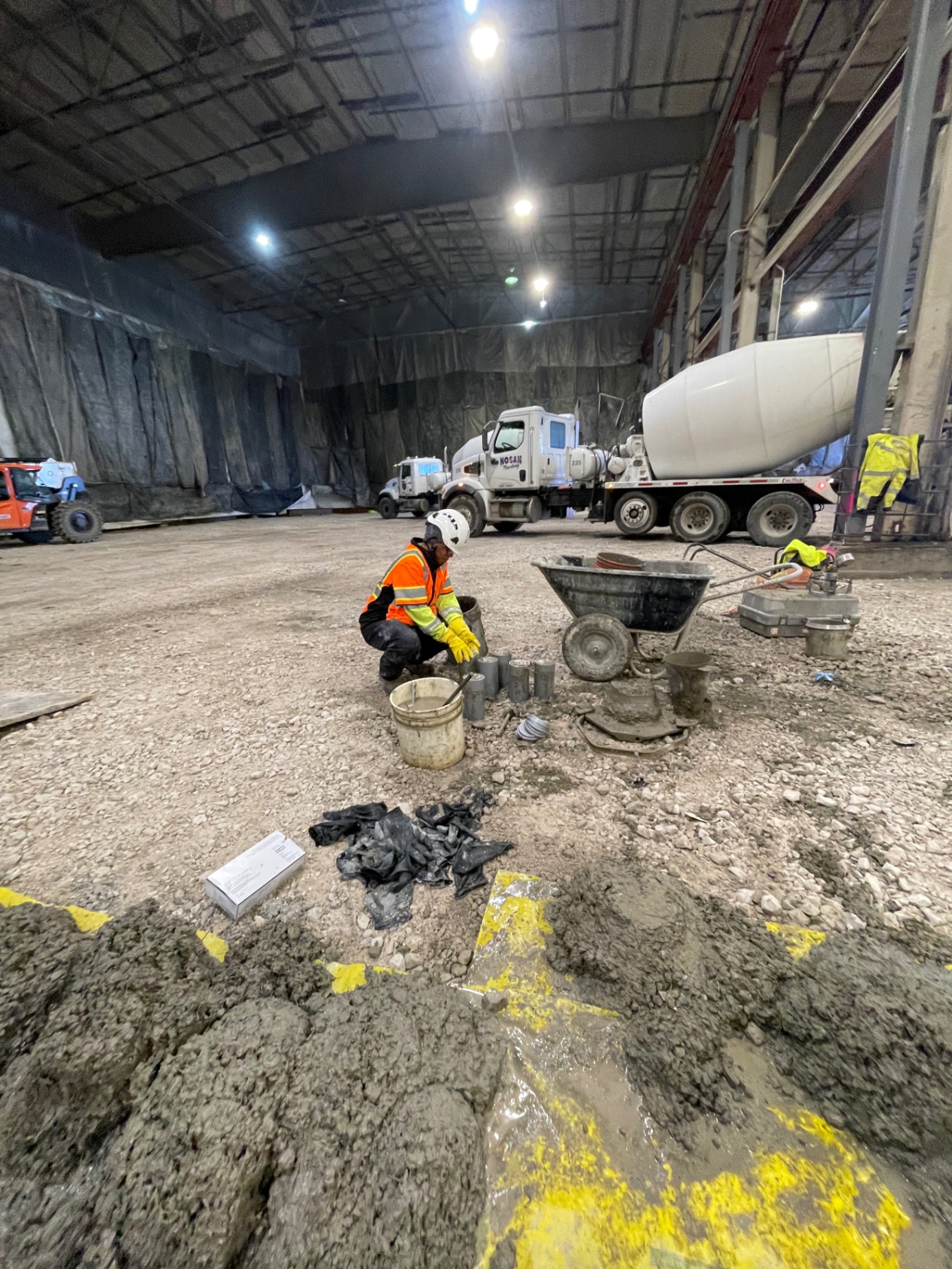 Concrete cylinder molds on job site